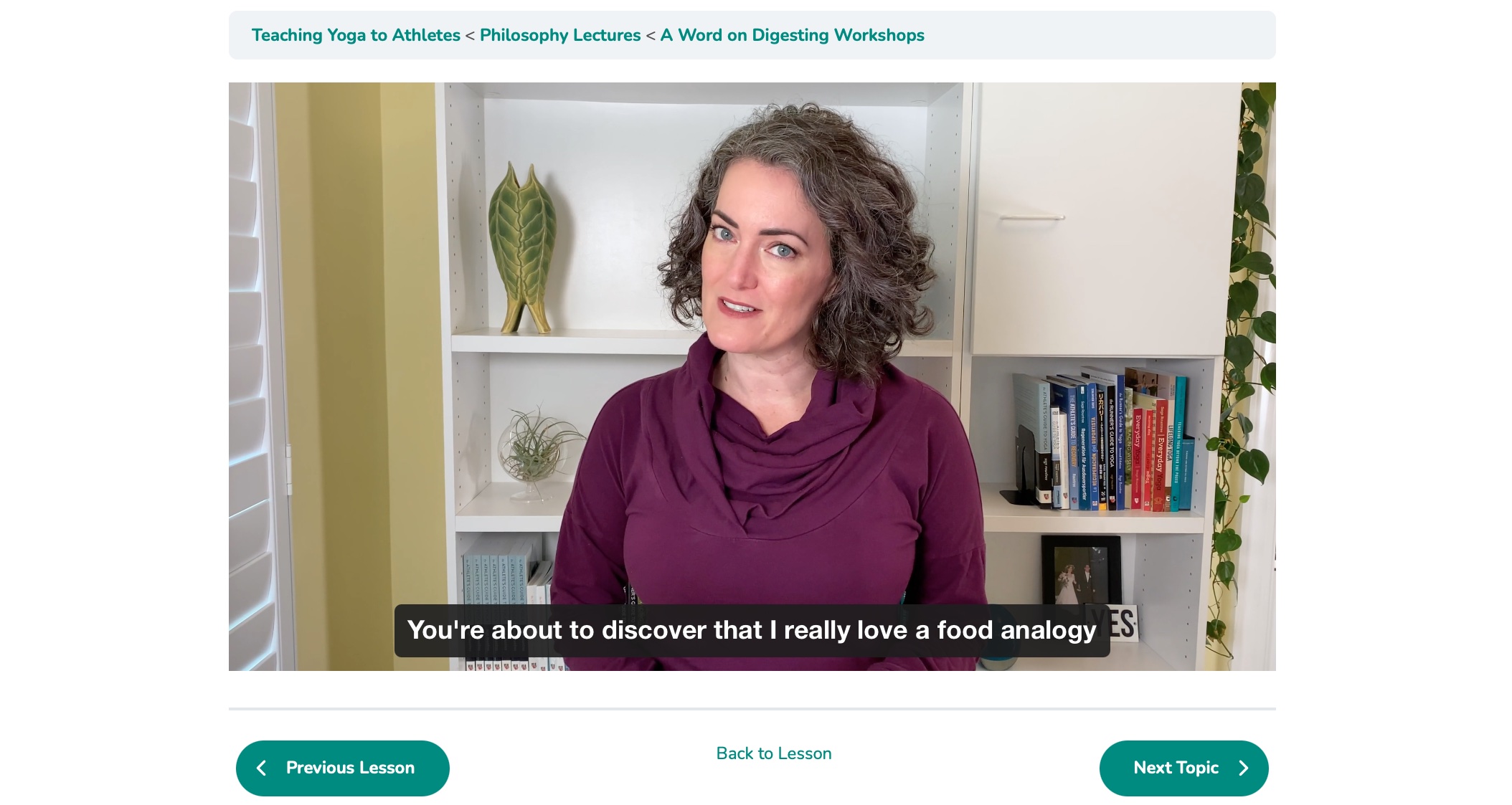 Video still of Sage lecturing with captions displayed